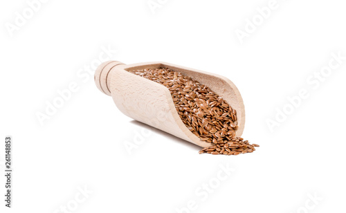 flax seed in wooden scoop isolated on white background. nutrition. bio. natural food ingredient.front view.