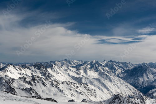 mountains in snow  blue sky  Sunny weather  white snow lying on the mountains