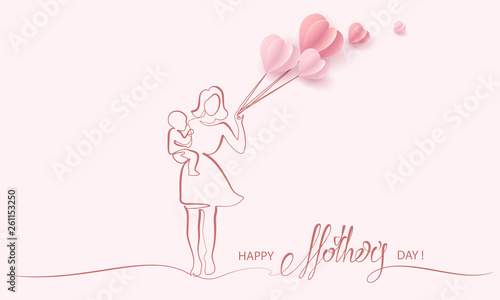 Woman hold her baby with air balloons