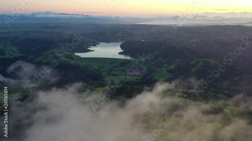 At sunrise, clouds drift over the San Francisco Bay area in California. photo