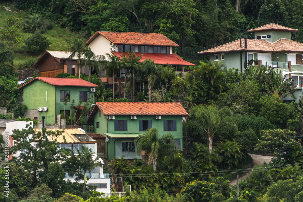 Confort houses at the hill side near the Conceicao Lagoon, in Florianopolis, Brazil. Confort houses at the hill side near the Conceicao Lagoon, in Florianopolis, Brazil.