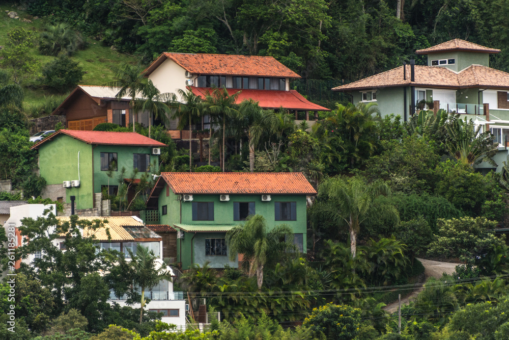 Confort houses at the hill side near the Conceicao Lagoon, in Florianopolis, Brazil.