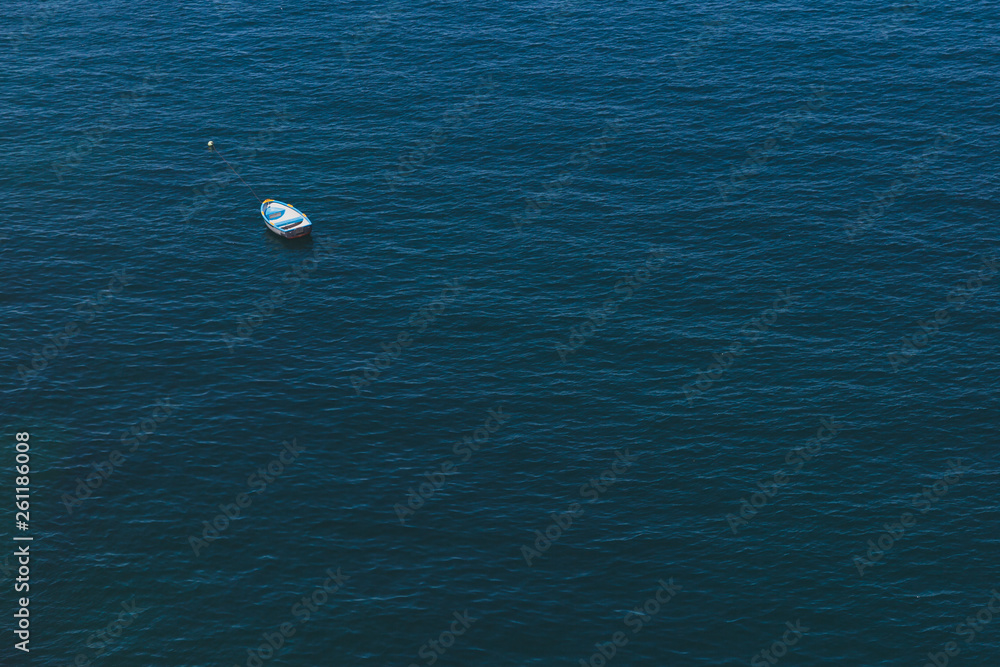 Boat over blue water near Valletta, Malta Boat over blue water near Valletta, Malta