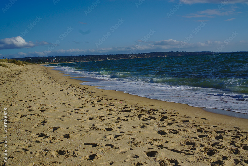 Seashore with blue water and clear sky Seashore with blue water and clear sky
