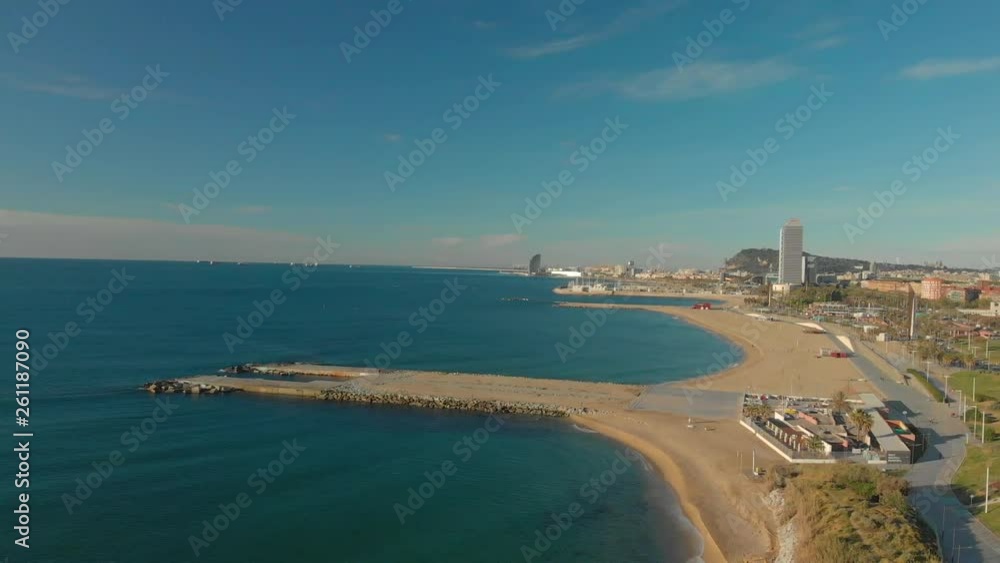 Aerial view of Barcelona from the beach, in the spring in the morning Aerial view of Barcelona from the beach, in the spring in the morning