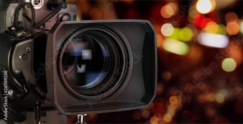 Professional video camera on dark background