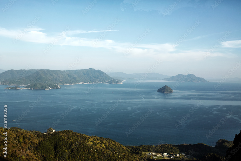 View over Miyajima and Hiroshima Bay from inside cabin of ropeway cable car.  Miyajima, Japan