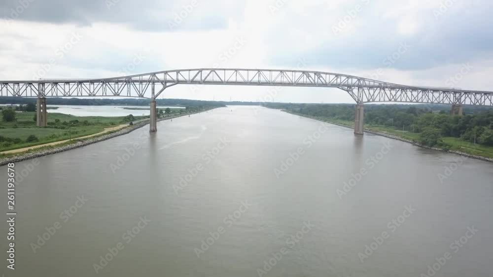 Drone flying over a river in Delaware. Boats and jetskis skidoos boating underneath. Drone flying over a river in Delaware. Boats and jetskis skidoos boating underneath.