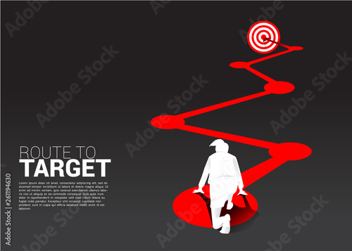 silhouette of businesswoman ready to run on route to dartboard. Business Concept of route to goal.