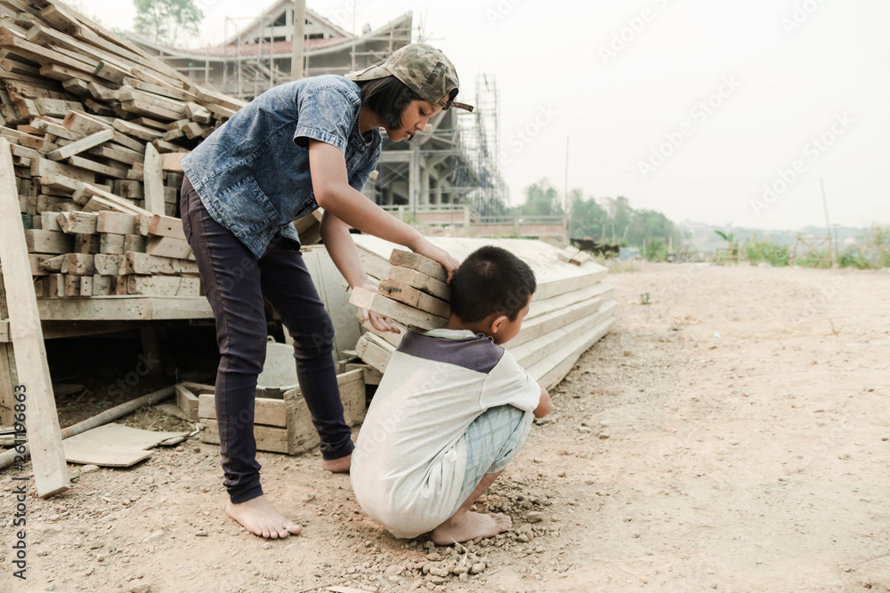 Child working in a brick factory. world day against child labour concept Child working in a brick factory. world day against child labour concept