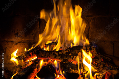 Wood burning in a cozy fireplace at home  keep warm