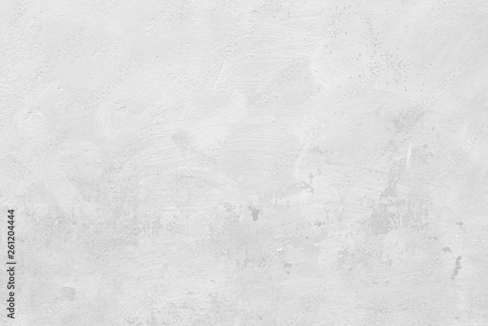 Close-up of a stone or concrete wall painted in white, paint slightly peeled off. Full frame texture background in black and white. - obrazy, fototapety, plakaty 