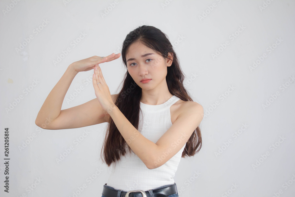 Portrait of thai china adult beautiful girl White shirt blue jeans Time out Portrait of thai china adult beautiful girl White shirt blue jeans Time out