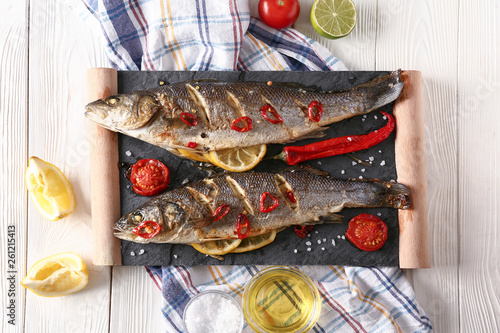 Two whole grilled fish with...