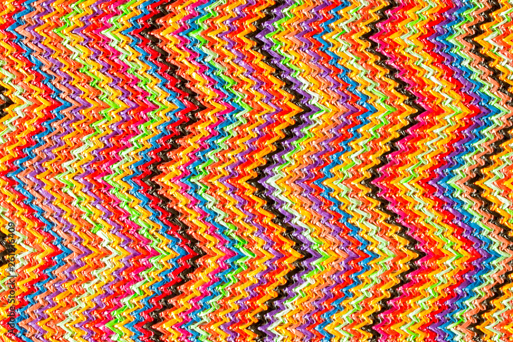 Abstract textured zigzag background of close up detail in woven raffia Abstract textured zigzag background of close up detail in woven raffia
