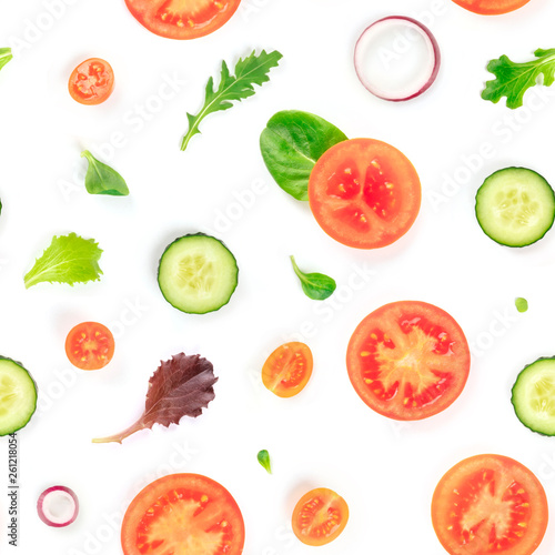 A seamless pattern of fresh vegetables and salad leaves.