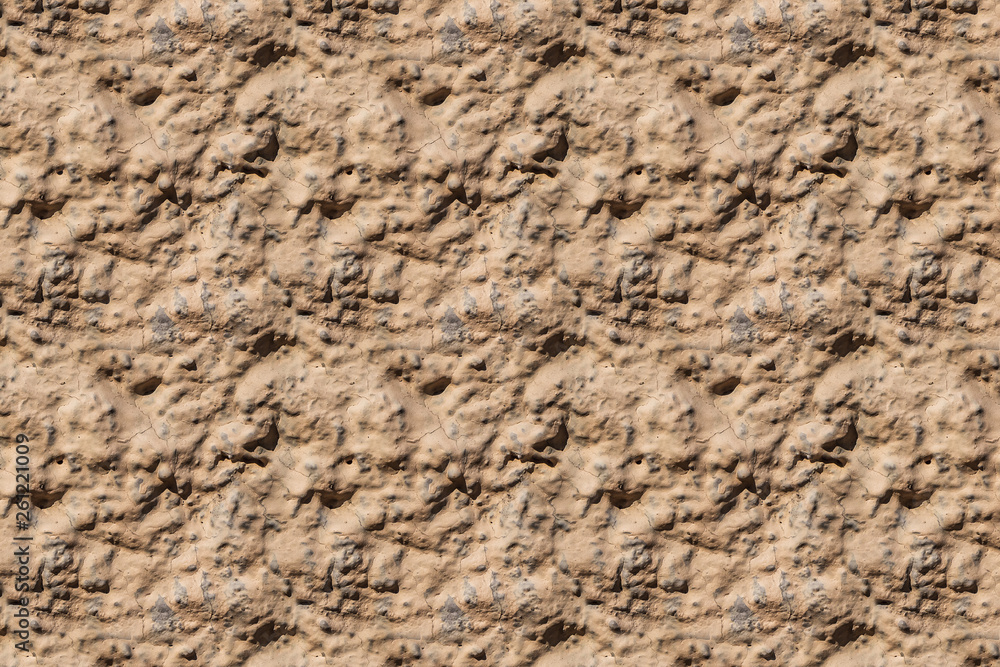 A beautiful horizontal texture of part of an old wall with yellow and orange plaster on the photo. Seamless pattern texture