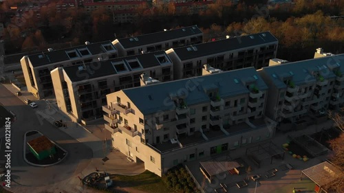 Aerial footage of newly developed apartements in suburb Orgryte torp at sunset in Gothenburg, Sweden photo