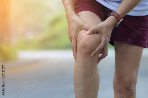 knee injury while running on road in the park.