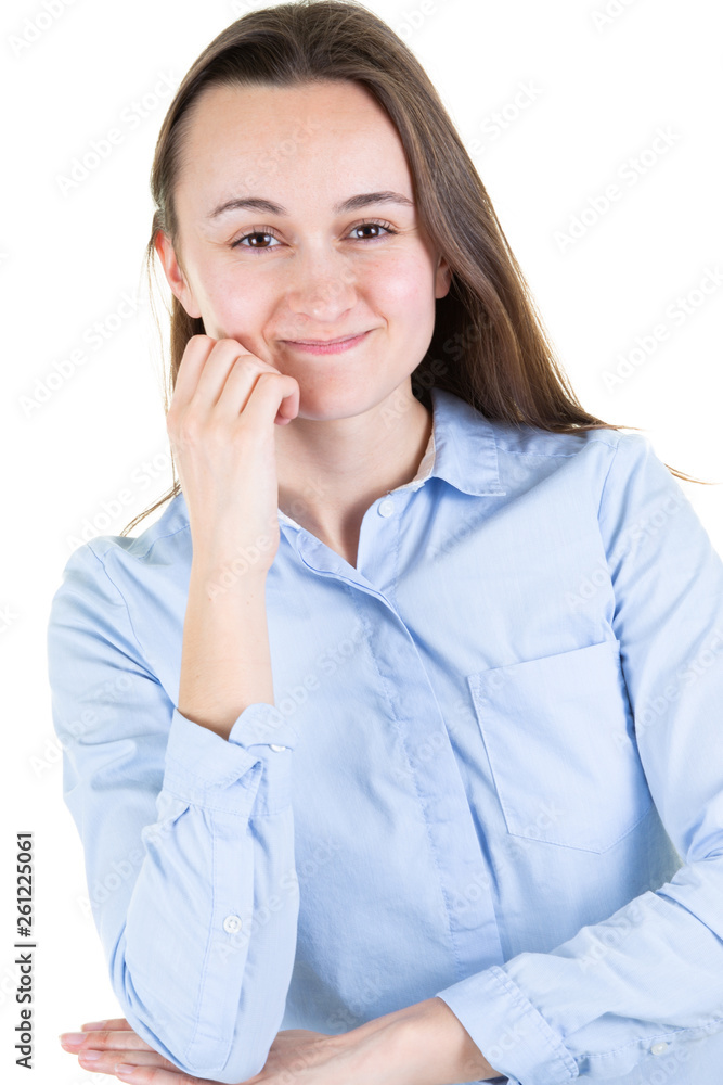 woman with fist on cheeks on blue shirt looks in camera woman with fist on cheeks on blue shirt looks in camera