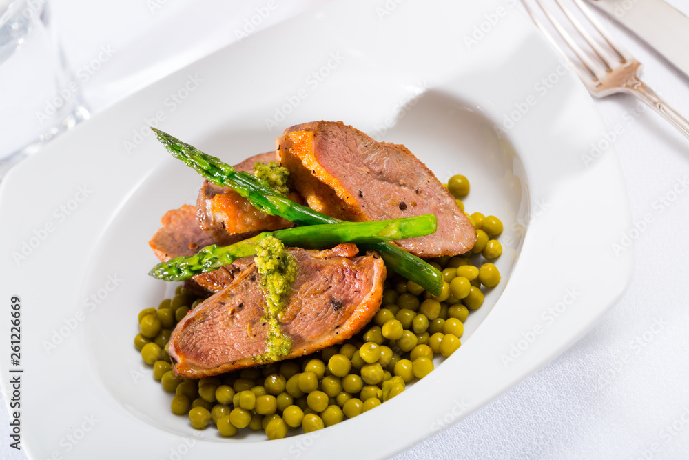 Grilled duck breast with vegetables