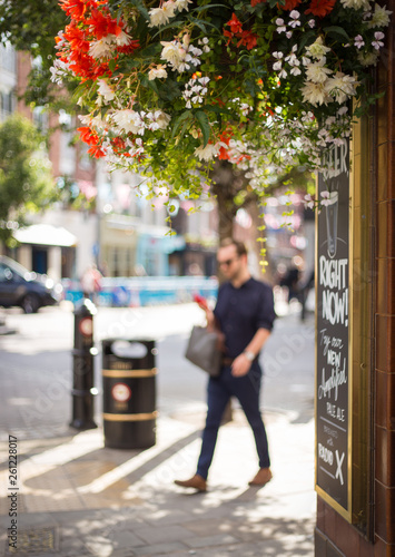Walking man in London city