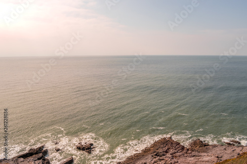 The coastline around gower  Wales with the waves conming into land