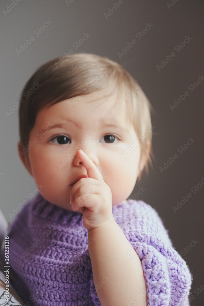 cute happy baby with finger in mouth cute happy baby with finger in mouth