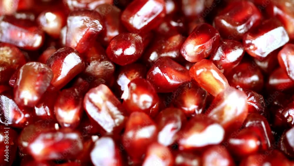 Rotating Pomegranate Seeds (not loopable 4K). Beautiful view Rotating Pomegranate Seeds (not loopable 4K). Beautiful view