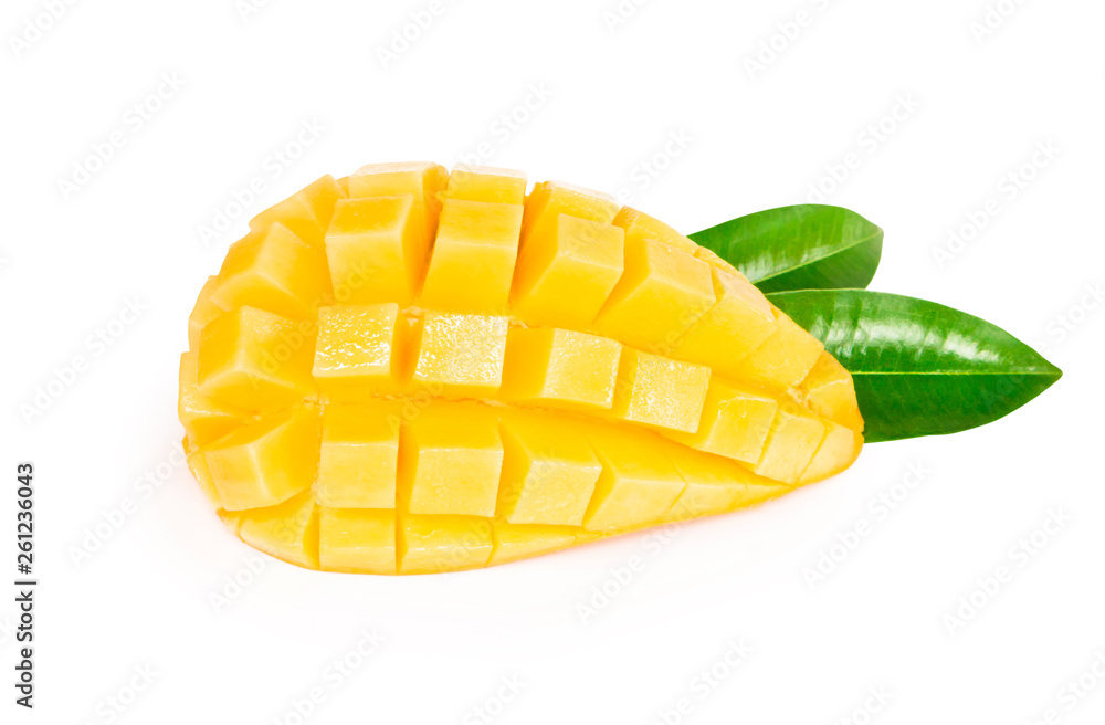 Closeup ripe mango tropical fruit slice with green leaves isolated on white background