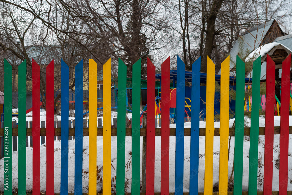 Multi colored wooden fence Multi colored wooden fence