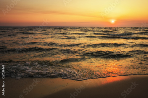 Fototapeta Naklejka Na Ścianę i Meble -  Colorful ocean beach sunrise. Dawn over the sea. Nature composition
