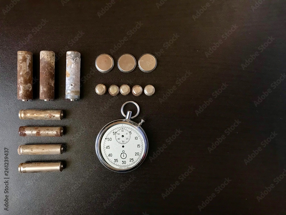 Corrosion-free batteries. Different size and shape. A broken stopwatch. Recycling and environmental protection. Corrosion-free batteries. Different size and shape. A broken stopwatch. Recycling and environmental protection.