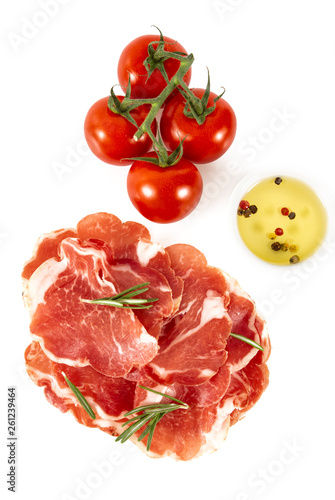 coppa di parma, cherry tomatoes and baguette isolated on white