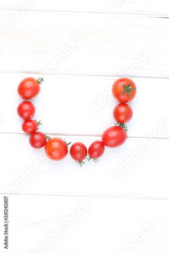 Fresh tomatoes on white backgrjund photo