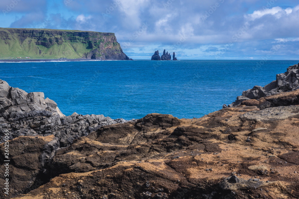 Reynisdrangar seastacks seen from Dyrholaey foreland located on the south coast of Iceland