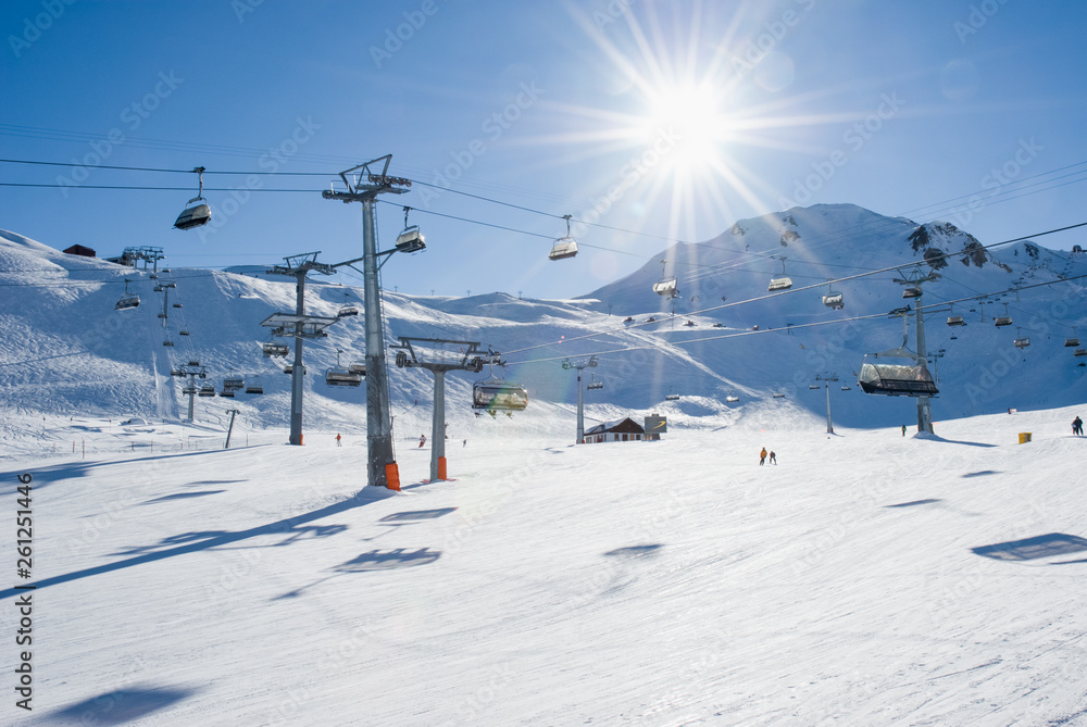 Many ski lifts crossing ski slope. Samnaun, Austria