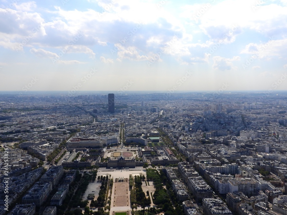 Champ de Mars view from top of eiffel tower looking down see the entire city as a beautiful classic architecture. A romantic place for lovers and family to visit.