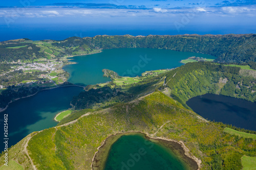 Fototapeta Naklejka Na Ścianę i Meble -  Aerial view of Sete Cidades at Lake Azul on the island Sao Miguel Azores, Portugal. Photo made from above by drone.