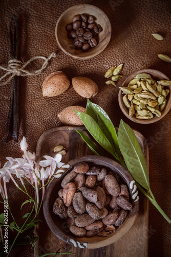 Spice and fruits on interesting leather background