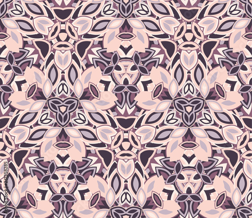 Kaleidoscope seamless pattern, background. Composed of colored abstract shapes. Useful as design element for texture and artistic compositions.