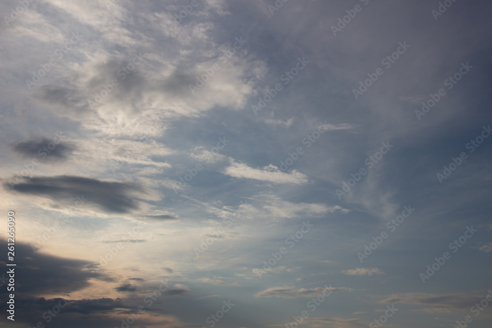 Beautiful sunset in the clouds, bright sun