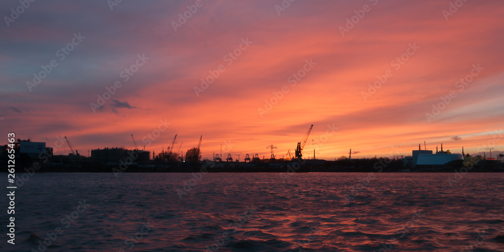 Elbe River in Hamburg Harbor at sunset.