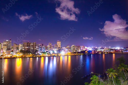 Beautiful Condado Beach, San Juan Puerto Rico seen at night with bay, buildings and lights