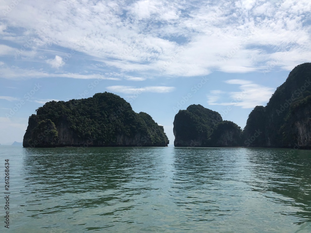 spectacular, unique view from the sea to the hanging cliffs of Thailand Islands on a clear day spectacular, unique view from the sea to the hanging cliffs of Thailand Islands on a clear day