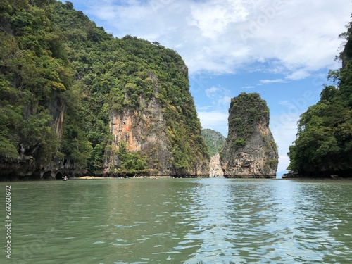 spectacular, unique view from the sea to the hanging cliffs of Thailand Islands on a clear day