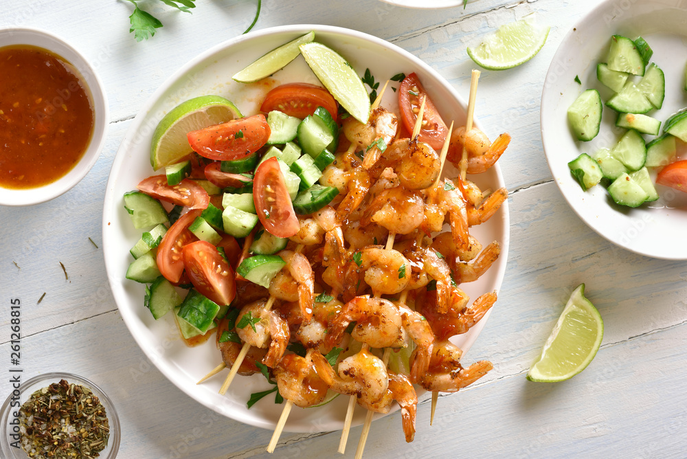Prawns skewers with sauce Prawns skewers with sauce