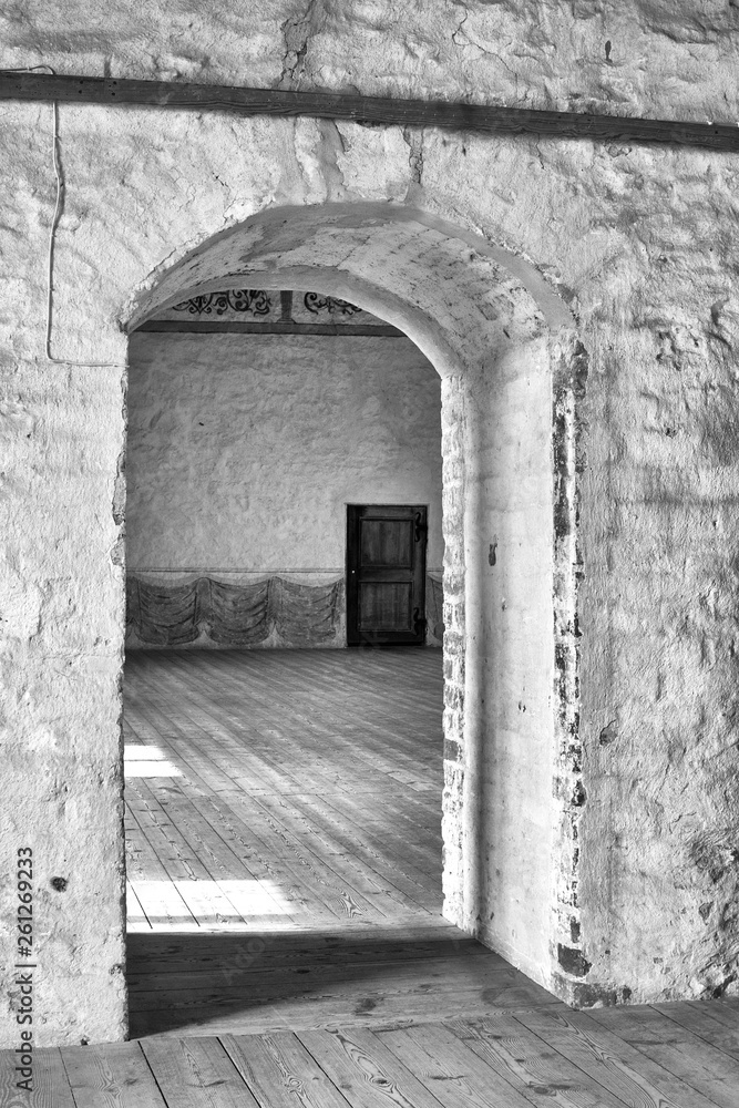 Mysterious wooden door in old castle