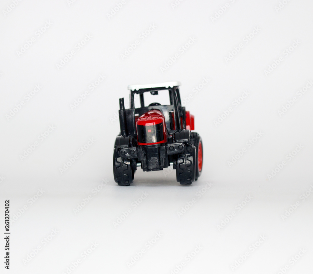Fototapeta premium toy tractor on white background