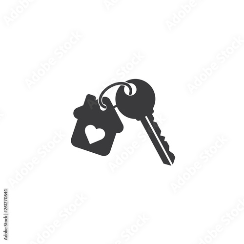 Keychain with key ring and a pendant house with heart locket.